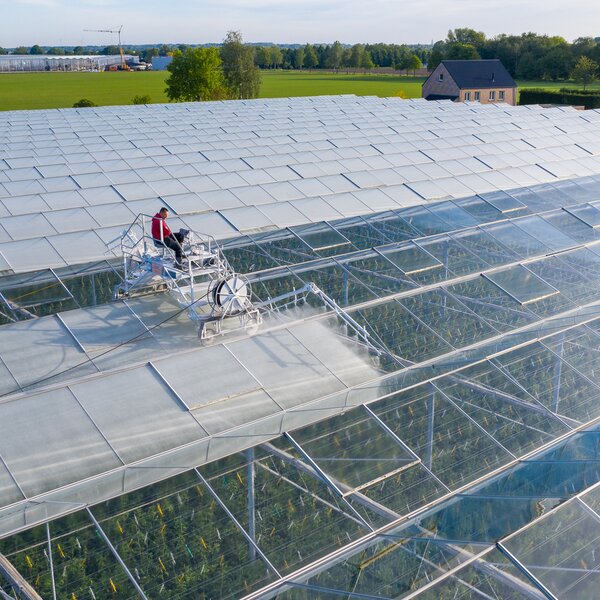 Machine application of ReduFuse IR on glass greenhouse